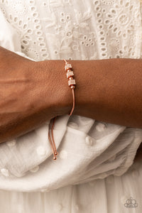 Roll Out the Radiance - White and Copper Bracelet- Paparazzi Accessories